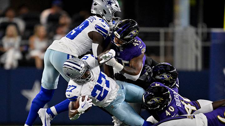 Aug 16, 2025; Arlington, Texas, USA; Baltimore Ravens linebacker Teddye Buchanan (40) and linebacker Mike Green (45) tackles Dallas Cowboys running back Miles Sanders (27) during the game between the Dallas Cowboys and the Baltimore Ravens at AT&T Stadium. Mandatory Credit: Jerome Miron-Imagn Images Aug 16, 2025; Arlington, Texas, USA; Baltimore Ravens linebacker Teddye Buchanan (40) and linebacker Mike Green (45) tackles Dallas Cowboys running back Miles Sanders (27) during the game between the Dallas Cowboys and the Baltimore Ravens at AT&T Stadium. Mandatory Credit: Jerome Miron-Imagn Images