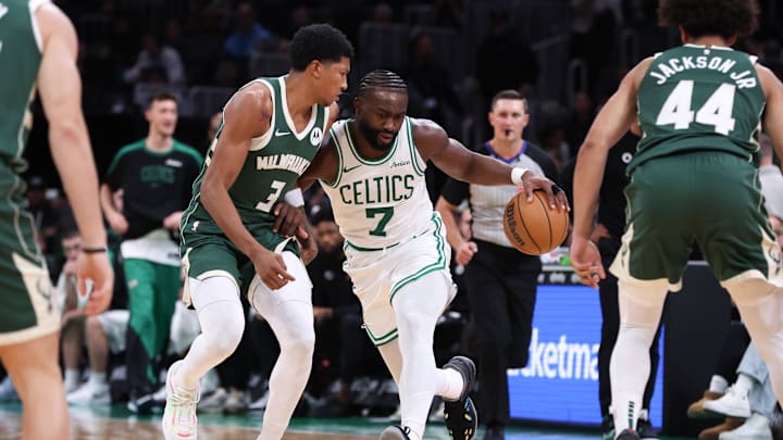 Oct 28, 2024; Boston, Massachusetts, USA; Boston Celtics forward Jaylen Brown (7) dribbles down the court defended by Milwaukee Bucks guard MarJon Beauchamp (3) during the second half at TD Garden. Mandatory Credit: Paul Rutherford-Imagn Images Oct 28, 2024; Boston, Massachusetts, USA; Boston Celtics forward Jaylen Brown (7) dribbles down the court defended by Milwaukee Bucks guard MarJon Beauchamp (3) during the second half at TD Garden. Mandatory Credit: Paul Rutherford-Imagn Images