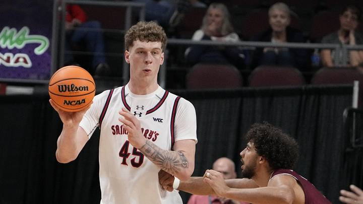 March 9, 2026; Las Vegas, NV, USA; Saint Mary's Gaels center Andrew McKeever (45) passes the basketball against Santa Clara Broncos center Bukky Oboye (12) during the first half at Orleans Arena. Mandatory Credit: Kyle Terada-Imagn Images March 9, 2026; Las Vegas, NV, USA; Saint Mary's Gaels center Andrew McKeever (45) passes the basketball against Santa Clara Broncos center Bukky Oboye (12) during the first half at Orleans Arena. Mandatory Credit: Kyle Terada-Imagn Images