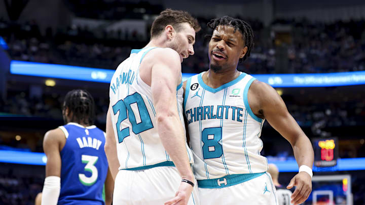 Mar 24, 2023; Dallas, Texas, USA; Charlotte Hornets forward Gordon Hayward (20) and guard Dennis Smith Jr. (8) celebrate during the third quarter against the Dallas Mavericks at American Airlines Center. Mandatory Credit: Kevin Jairaj-Imagn Images Mar 24, 2023; Dallas, Texas, USA; Charlotte Hornets forward Gordon Hayward (20) and guard Dennis Smith Jr. (8) celebrate during the third quarter against the Dallas Mavericks at American Airlines Center. Mandatory Credit: Kevin Jairaj-Imagn Images
