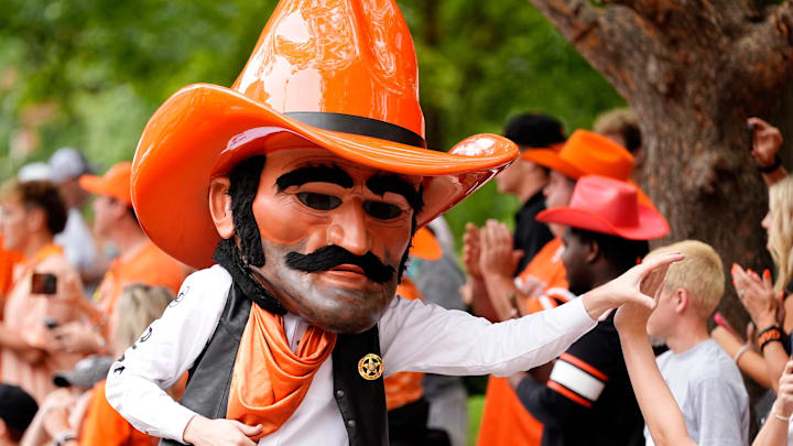 Pistol Pete high fives fans during the Spirit Walk before the college football game between the Oklahoma State Cowboys and South Dakota State Jackrabbits at Boone Pickens Stadium in Stillwater, Okla., Saturday, Aug., 31, 2024. Pistol Pete high fives fans during the Spirit Walk before the college football game between the Oklahoma State Cowboys and South Dakota State Jackrabbits at Boone Pickens Stadium in Stillwater, Okla., Saturday, Aug., 31, 2024.