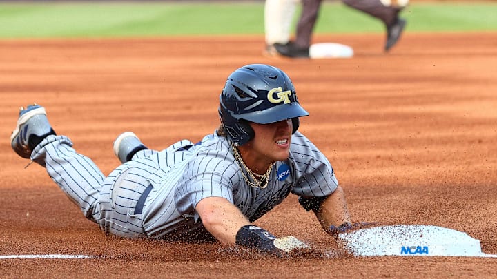May 31, 2025; Oxford, MS, USA; Georgia Tech Yellowjackets outfielder Drew Burress (8) slides into third base during the first inning against the Murray State Racers. Mandatory Credit: Petre Thomas-Imagn Images