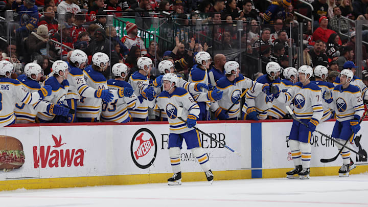 Dec 21, 2025; Newark, New Jersey, USA;  Buffalo Sabres left wing Zach Benson (6) celebrates his goal against the New Jersey Devils during the first second period at Prudential Center. Mandatory Credit: Thomas Salus-Imagn Images