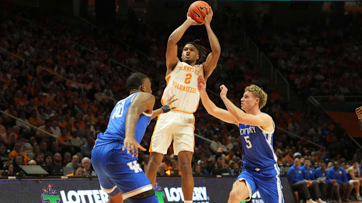 Tennessee's Chaz Lanier (2) with the shot attempt over Kentucky's Collin Chandler (5) and Brandon Garrison (10) during an NCAA college basketball game on Tuesday, Jan. 28, 2025, in Knoxville, Tenn.