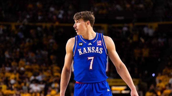 Mar 3, 2026; Tempe, Arizona, USA; Kansas Jayhawks guard Kohl Rosario (7) against the Arizona State Sun Devils at Desert Financial Arena. Mandatory Credit: Mark J. Rebilas-Imagn Images