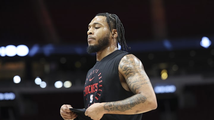 Mar 23, 2025; Houston, Texas, USA; Houston Rockets forward Cam Whitmore (7) walks on the court before the game against the Denver Nuggets at Toyota Center. Mandatory Credit: Troy Taormina-Imagn Images