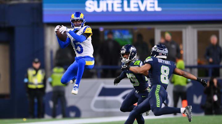 Nov 3, 2024; Seattle, Washington, USA; Los Angeles Rams wide receiver Tutu Atwell (5) catches a pass against the Seattle Seahawks during overtime at Lumen Field. Mandatory Credit: Steven Bisig-Imagn Images
