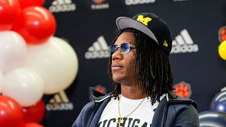 Michigan football signee Elijah Dotson looks on during national signing day at Belleville High School in Belleville on Wednesday, Dec. 4, 2024.
