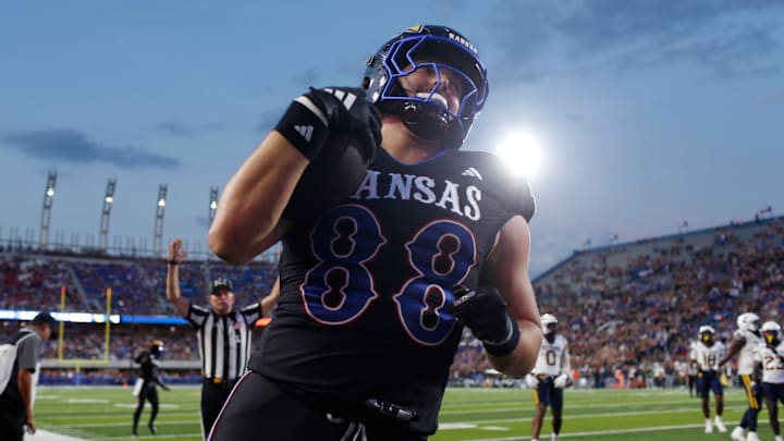 Kansas Jayhawks tight end Boden Groen (88) runs the ball in for a touchdown during the second half of the game against West Virginia Mountaineers at David Booth Kansas Memorial Stadium on Sept. 20, 2025. Kansas Jayhawks tight end Boden Groen (88) runs the ball in for a touchdown during the second half of the game against West Virginia Mountaineers at David Booth Kansas Memorial Stadium on Sept. 20, 2025.