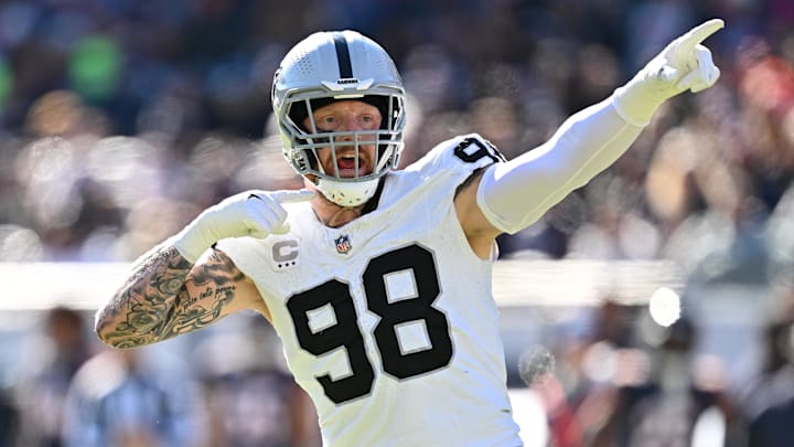 Las Vegas Raiders defensive end Maxx Crosby (98) reacts after the Chicago Bears jumped the snap in the third quarter at Soldier Field on October 22, 2023.