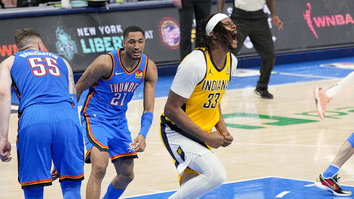 Jun 8, 2025; Oklahoma City, Oklahoma, USA; Indiana Pacers center Myles Turner (33) celebrates after he dunks the ball past Oklahoma City Thunder center Isaiah Hartenstein (55) during the fourth quarter of game two of the 2025 NBA Finals at Paycom Center. Mandatory Credit: Kyle Terada-Imagn Images