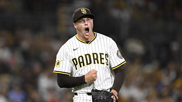 Sep 9, 2025; San Diego, California, USA; San Diego Padres relief pitcher Mason Miller (22) celebrates after striking out a batter during the eighth inning against the Cincinnati Reds at Petco Park. Sep 9, 2025; San Diego, California, USA; San Diego Padres relief pitcher Mason Miller (22) celebrates after striking out a batter during the eighth inning against the Cincinnati Reds at Petco Park.