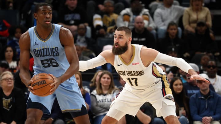 Feb 12, 2024; Memphis, Tennessee, USA; Memphis Grizzlies center Trey Jemison (55) handles the ball as New Orleans Pelicans center Jonas Valanciunas (17) defends during the second half at FedExForum. Feb 12, 2024; Memphis, Tennessee, USA; Memphis Grizzlies center Trey Jemison (55) handles the ball as New Orleans Pelicans center Jonas Valanciunas (17) defends during the second half at FedExForum.