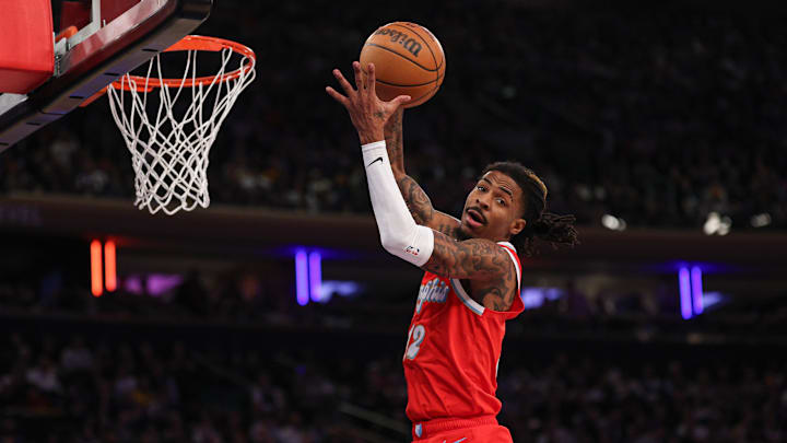 Jan 27, 2025; New York, New York, USA; Memphis Grizzlies guard Ja Morant (12) rebounds during the second half against the New York Knicks at Madison Square Garden. Mandatory Credit: Vincent Carchietta-Imagn Images