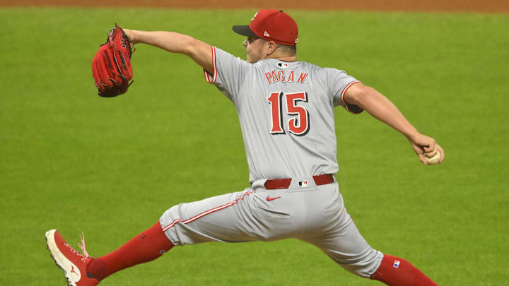 Cincinnati Reds relief pitcher Emilio Pagan (15) pitches in the seventh inning against the Cleveland Guardians at Progressive Field on Sept 24. Cincinnati Reds relief pitcher Emilio Pagan (15) pitches in the seventh inning against the Cleveland Guardians at Progressive Field on Sept 24.