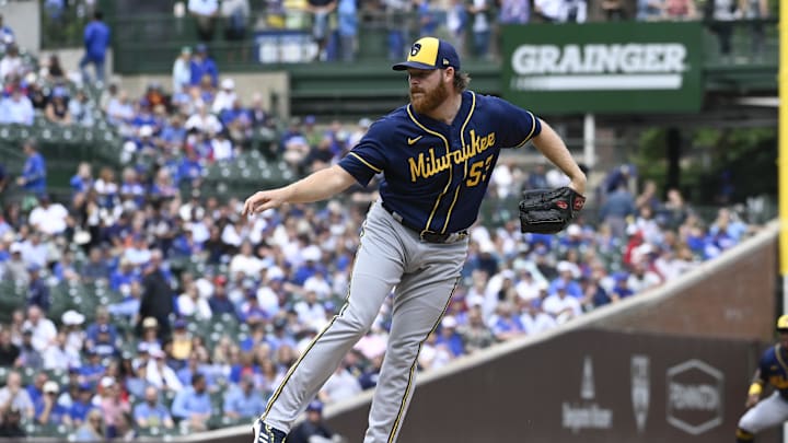 Milwaukee Brewers starting pitcher Brandon Woodruff (53) delivers a pitch against the Chicago Cubs during the first inning at Wrigley Field in 2023.