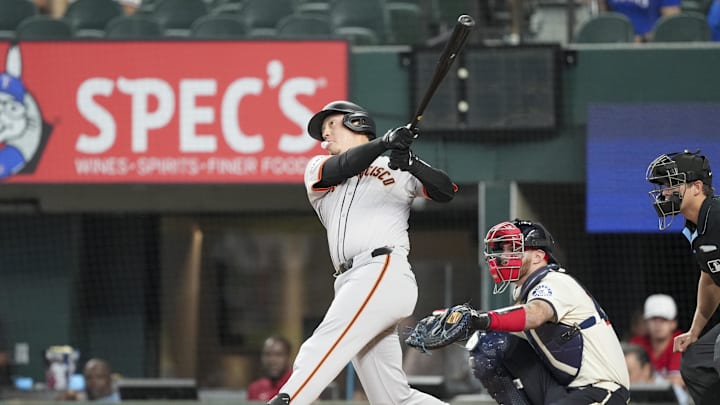 Jun 7, 2024; Arlington, Texas, USA; San Francisco Giants first baseman Wilmer Flores (41) follows through on his solo home run against the Texas Rangers during the second inning at Globe Life Field. Mandatory Credit: Jim Cowsert-USA TODAY Sports Jun 7, 2024; Arlington, Texas, USA; San Francisco Giants first baseman Wilmer Flores (41) follows through on his solo home run against the Texas Rangers during the second inning at Globe Life Field. Mandatory Credit: Jim Cowsert-USA TODAY Sports
