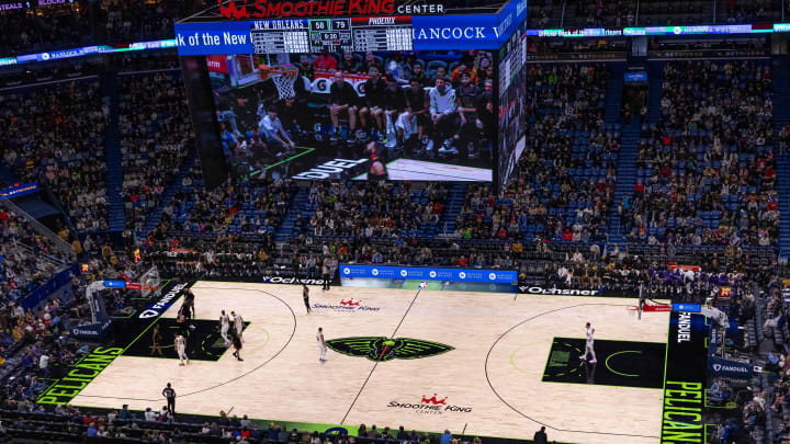 Jan 19, 2024; New Orleans, Louisiana, USA; Detailed view of the arena with the new City Edition court during the second half of the game between the New Orleans Pelicans and the Phoenix Suns at Smoothie King Center. Jan 19, 2024; New Orleans, Louisiana, USA; Detailed view of the arena with the new City Edition court during the second half of the game between the New Orleans Pelicans and the Phoenix Suns at Smoothie King Center.