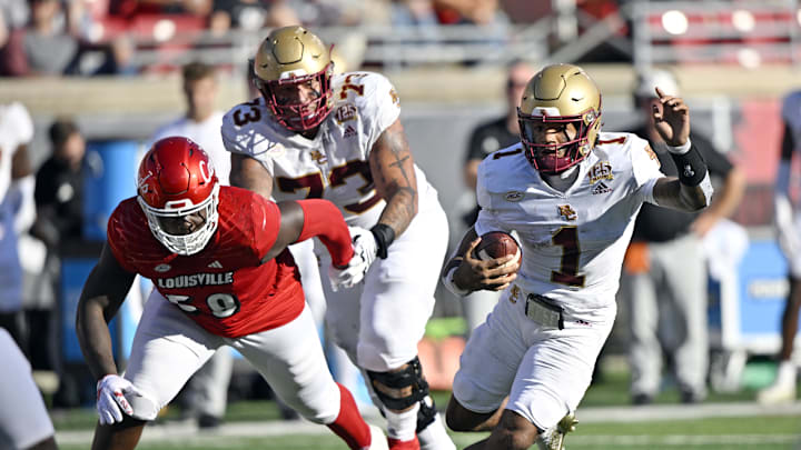 Sep 23, 2023; Louisville, Kentucky, USA;  Boston College Eagles quarterback Thomas Castellanos (1) runs the ball against the Louisville Cardinals during the second half at L&N Federal Credit Union Stadium. Louisville defeated Boston College 56-28. Mandatory Credit: Jamie Rhodes-Imagn Images