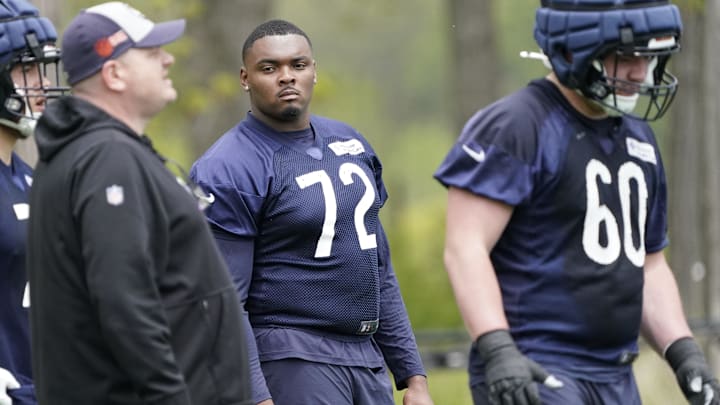 Kiran Amegadjie picks the brain of offensive line coach Chris Morgan during Bears rookie camp. Amegadjie is expected to be healthy for the start of training camp. Kiran Amegadjie picks the brain of offensive line coach Chris Morgan during Bears rookie camp. Amegadjie is expected to be healthy for the start of training camp.