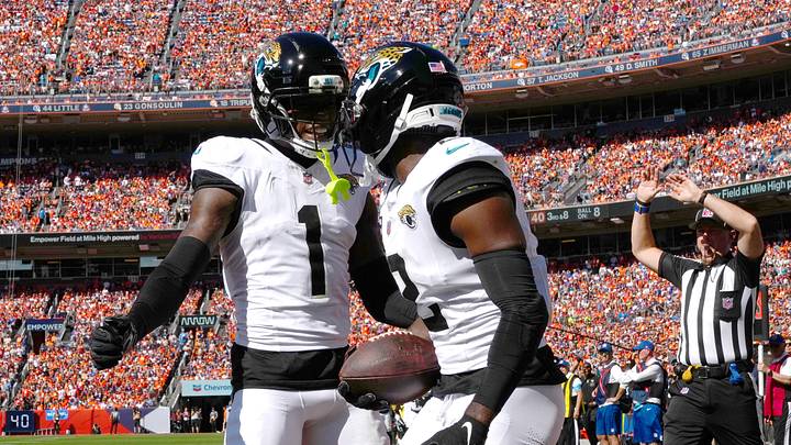 Sep 20, 2026; Denver, Colorado, USA; Jacksonville Jaguars cornerback Jourdan Lewis (2) celebrates his interception with cornerback Montaric Brown (1) against the Denver Broncos during the second quarter at Empower Field at Mile High. Mandatory Credit: Ron Chenoy-Imagn Images Sep 20, 2026; Denver, Colorado, USA; Jacksonville Jaguars cornerback Jourdan Lewis (2) celebrates his interception with cornerback Montaric Brown (1) against the Denver Broncos during the second quarter at Empower Field at Mile High. Mandatory Credit: Ron Chenoy-Imagn Images