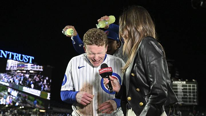 May 6, 2026; Chicago, Illinois, USA;  Chicago Cubs center fielder Pete Crow-Armstrong (4) is dunked by  third baseman Nicky Lopez (5) after the game against the Cincinnati Reds  at Wrigley Field. Mandatory Credit: Matt Marton-Imagn Images