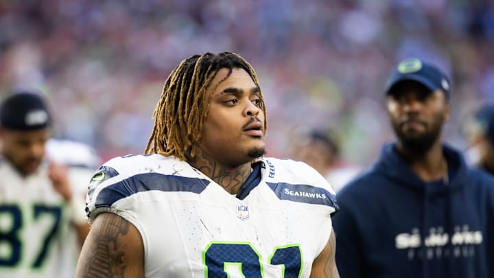 Dec 8, 2024; Glendale, Arizona, USA; Seattle Seahawks defensive tackle Byron Murphy II (91) against the Arizona Cardinals at State Farm Stadium. Mandatory Credit: Mark J. Rebilas-Imagn Images