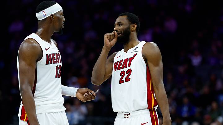 Jan 20, 2026; Sacramento, California, USA; Miami Heat center Bam Adebayo (13) and forward Andrew Wiggins (22) talk a timeout during the second quarter against the Sacramento Kings at Golden 1 Center. Mandatory Credit: Sergio Estrada-Imagn Images