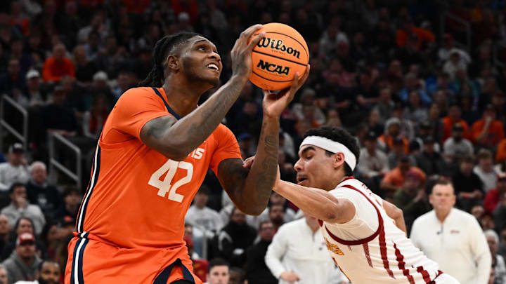 Mar 28, 2024; Boston, MA, USA; Illinois Fighting Illini forward Dain Dainja (42) shoots the ball