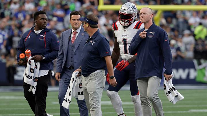 Sep 9, 2026; Seattle, Washington, USA; New England Patriots wide receiver A.J. Brown (1) is tended to by trainers after injuring his ankle during the third quarter against the Seattle Seahawks at Lumen Field. Mandatory Credit: Joe Nicholson-Imagn Images Sep 9, 2026; Seattle, Washington, USA; New England Patriots wide receiver A.J. Brown (1) is tended to by trainers after injuring his ankle during the third quarter against the Seattle Seahawks at Lumen Field. Mandatory Credit: Joe Nicholson-Imagn Images