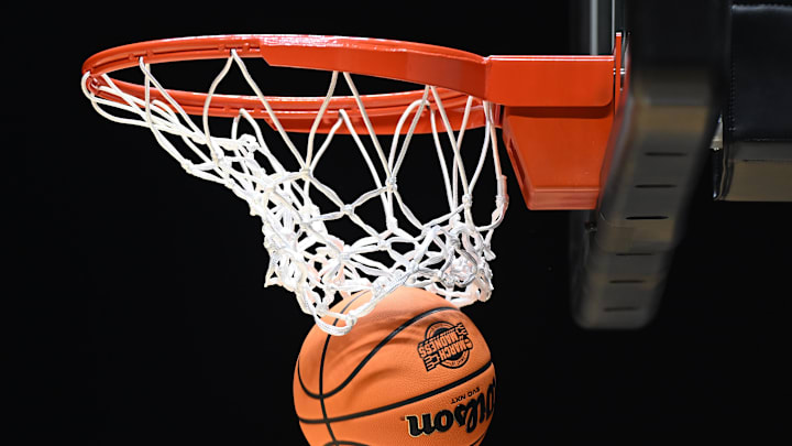 Mar 27, 2025; Indianapolis, IN, USA; The March Madness logo is seen on a basketball during the NCAA tournament midwest regional practice day at Lucas Oil Stadium. Mandatory Credit: Robert Goddin-Imagn Images