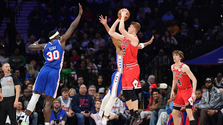 Apr 13, 2025; Philadelphia, Pennsylvania, USA; Chicago Bulls guard Kevin Huerter (13) shoots the ball against Philadelphia 76ers center Adem Bona (30) in the first quarter at Wells Fargo Center. Mandatory Credit: Kyle Ross-Imagn Images Apr 13, 2025; Philadelphia, Pennsylvania, USA; Chicago Bulls guard Kevin Huerter (13) shoots the ball against Philadelphia 76ers center Adem Bona (30) in the first quarter at Wells Fargo Center. Mandatory Credit: Kyle Ross-Imagn Images
