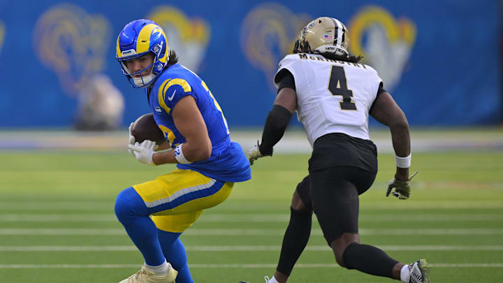 Nov 2, 2025; Inglewood, California, USA; Los Angeles Rams wide receiver Puka Nacua (12) looks to make a move on New Orleans Saints cornerback Kool-Aid McKinstry (4) during the first half at SoFi Stadium. Mandatory Credit: Jayne Kamin-Oncea-Imagn Images