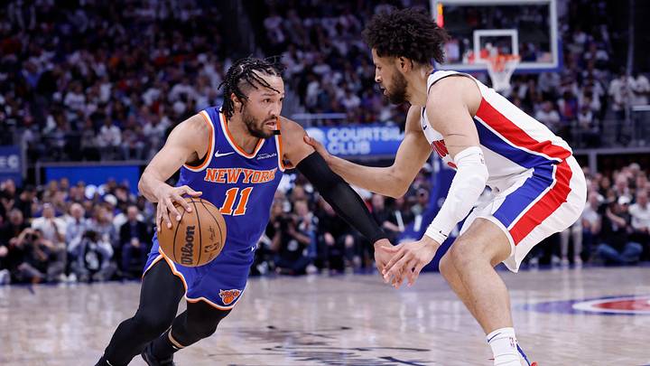 May 1, 2025; Detroit, Michigan, USA; New York Knicks guard Jalen Brunson (11) dribbles on Detroit Pistons guard Cade Cunningham (2) in the first half during game six of first round for the 2024 NBA Playoffs at Little Caesars Arena. Mandatory Credit: Rick Osentoski-Imagn Images