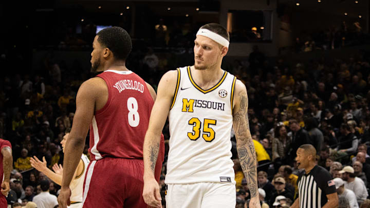 Feb. 19, 2025; Columbia, Missouri, USA; Missouri Tigers Jacob Crews (35) against Alabama Crimson Tide guard Chris Youngblood at Mizzou Arena.