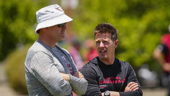 Cardinals general manager Monti Ossenfort (left) talks with head coach Mike LaFleur during organized team activities at the Cardinals Training Facility in Tempe on May 27, 2026.