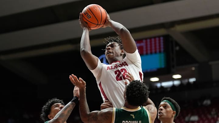 Dec 17, 2025; Tuscaloosa, AL, USA; Alabama forward Aiden Sherrell (22) goes for a shot over South Florida guard CJ Brown (11) at Coleman Coliseum. Mandatory Credit: Gary Cosby Jr.-Tuscaloosa News Dec 17, 2025; Tuscaloosa, AL, USA; Alabama forward Aiden Sherrell (22) goes for a shot over South Florida guard CJ Brown (11) at Coleman Coliseum. Mandatory Credit: Gary Cosby Jr.-Tuscaloosa News