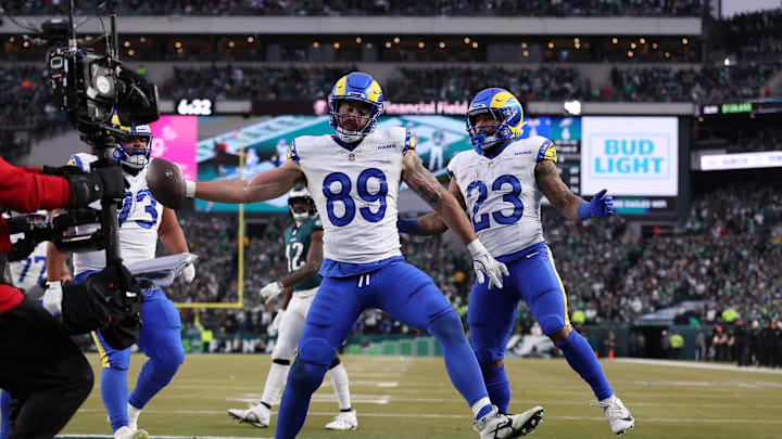 Jan 19, 2025; Philadelphia, Pennsylvania, USA; Los Angeles Rams tight end Tyler Higbee (89) celebrates after scoring a touchdown in the first quarter against the Philadelphia Eagles in a 2025 NFC divisional round game at Lincoln Financial Field. 