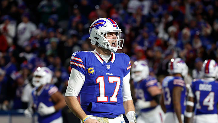 Buffalo Bills quarterback Josh Allen (17) celebrates his 81 yard touchdown pass to Buffalo Bills