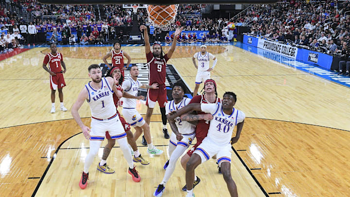 Mar 20, 2025; Providence, RI, USA;  Arkansas Razorbacks forward Jonas Aidoo (9) makes a free throw against Kansas Jayhawks during the second half at Amica Mutual Pavilion. Mandatory Credit: Eric Canha-Imagn Images