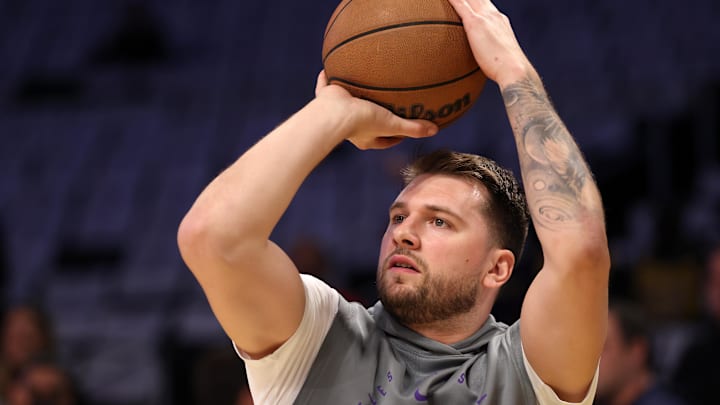 Apr 22, 2025; Los Angeles, California, USA; Los Angeles Lakers guard Luka Doncic (77) warms up before a game two of first round for the 2024 NBA Playoffs against the Minnesota Timberwolves at Crypto.com Arena. Mandatory Credit: Kiyoshi Mio-Imagn Images