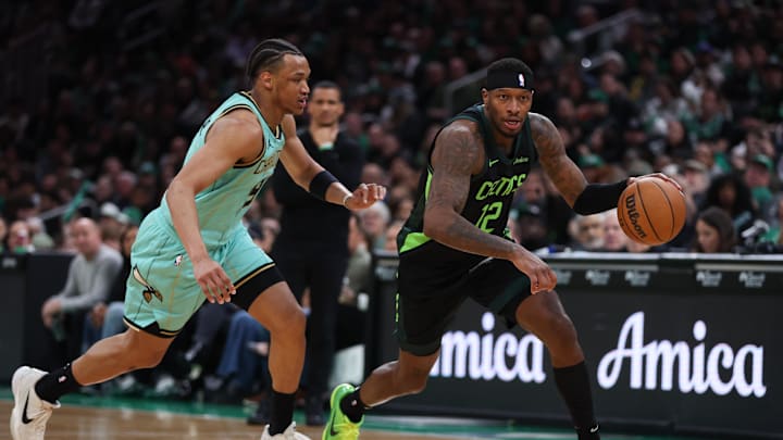 Apr 13, 2025; Boston, Massachusetts, USA; Boston Celtics forward Torrey Craig (12) dribbles down the court during the first half against the Charlotte Hornets at TD Garden. Mandatory Credit: Paul Rutherford-Imagn Images Apr 13, 2025; Boston, Massachusetts, USA; Boston Celtics forward Torrey Craig (12) dribbles down the court during the first half against the Charlotte Hornets at TD Garden. Mandatory Credit: Paul Rutherford-Imagn Images