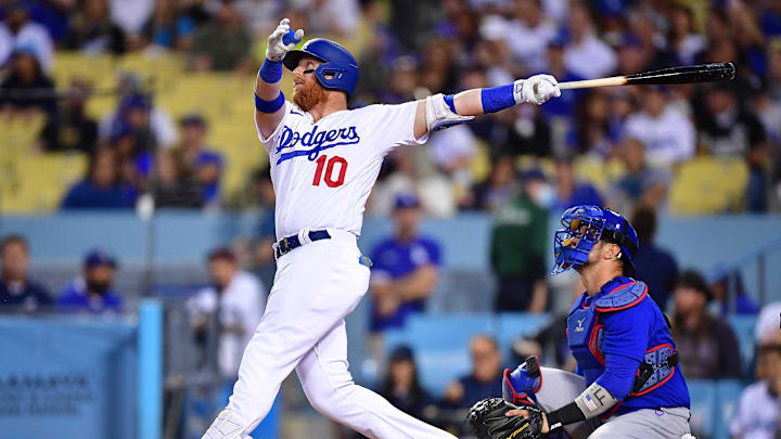 Los Angeles Dodgers designated hitter Justin Turner (10) hits a solo home run against the Chicago Cubs during the fourth inning at Dodger Stadium. 
