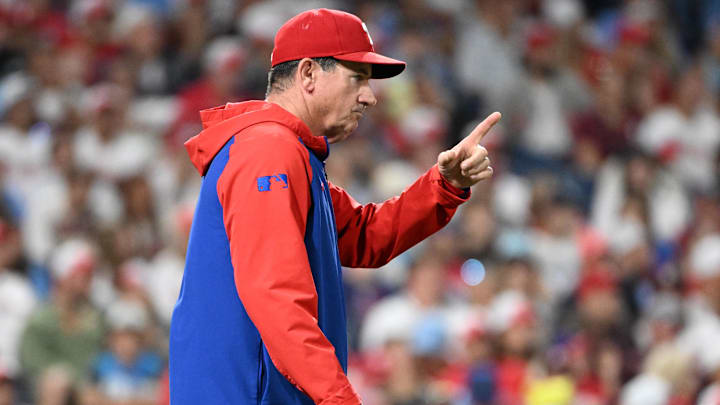 Aug 31, 2025; Philadelphia, Pennsylvania, USA; Philadelphia Phillies manager Rob Thomson (49) walks to the mound to make a pitching change during the eighth inning against the Atlanta Braves at Citizens Bank Park. Mandatory Credit: Eric Hartline-Imagn Images
