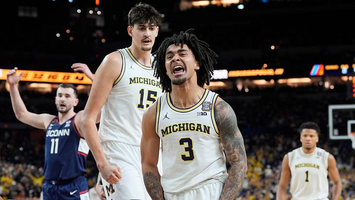 Michigan guard Elliot Cadeau celebrates a play during the first half of the NCAA national championship game against Connecticut at Lucas Oil Stadium in Indianapolis on Monday, April 6, 2026.