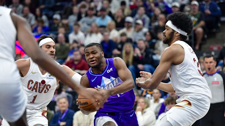 Mar 23, 2025; Salt Lake City, Utah, USA; Utah Jazz guard Isaiah Collier (13) makes a drive against Cleveland Cavaliers guard/forward Max Strus (1) during the first half at Delta Center. Mandatory Credit: Peter Creveling-Imagn Images Mar 23, 2025; Salt Lake City, Utah, USA; Utah Jazz guard Isaiah Collier (13) makes a drive against Cleveland Cavaliers guard/forward Max Strus (1) during the first half at Delta Center. Mandatory Credit: Peter Creveling-Imagn Images