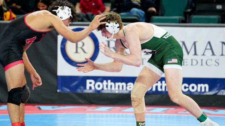 Carl Betz (right) , of Delbarton, is shown against Rober Barrezueta, of Morris Hills, in a 157 pound match, during the opening round of the NJSIAA Wrestling State Championships, Thursday, February 29, 2024, in Atlantic City. Betz would go on to win the match.