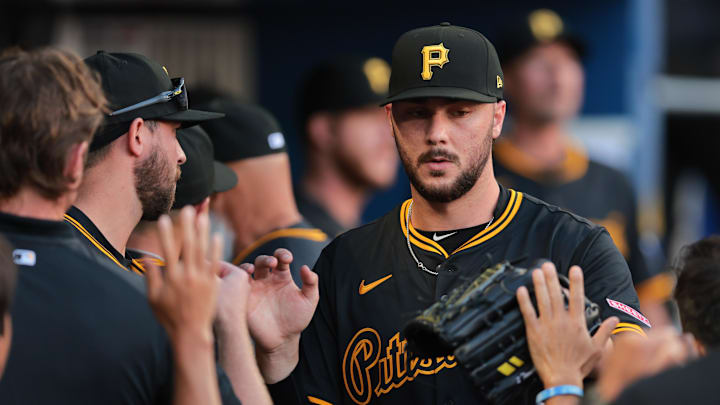 Mar 27, 2025; Miami, Florida, USA; Pittsburgh Pirates starting pitcher Paul Skenes (30) celebrates with teammates after leaving the game against the Miami Marlins during the sixth inning at loanDepot Park. Mandatory Credit: Sam Navarro-Imagn Images