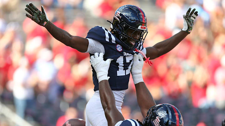 Nov 8, 2025; Oxford, Mississippi, USA; Mississippi Rebels wide receiver Winston Watkins (17) reacts with offensive lineman Diego Pounds (61) after a touchdown during the first quarter against The Citadel Bulldogs at Vaught-Hemingway Stadium. Mandatory Credit: Petre Thomas-Imagn Images