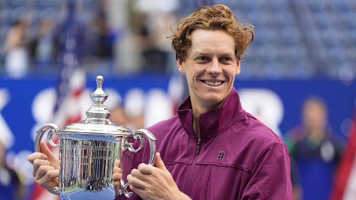 Sep 8, 2024; Flushing, NY, USA; Jannik Sinner (ITA) celebrates with the trophy after defeating Taylor Fritz (USA) in the men’s singles final of the 2024 U.S. Open tennis tournament at USTA Billie Jean King National Tennis Center.